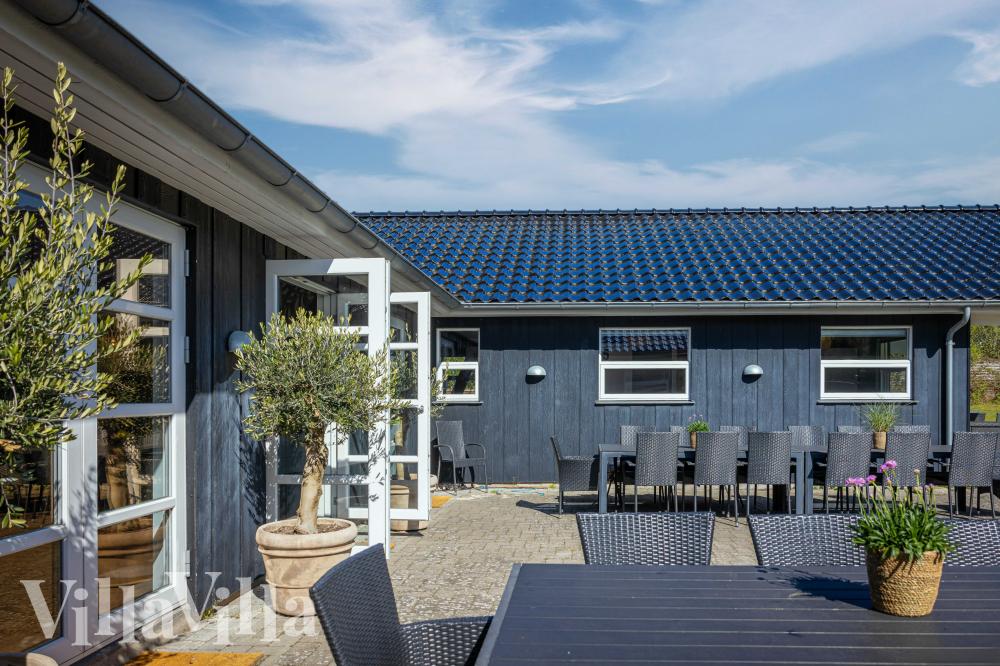 Das Luxusferienhaus Nr. 991 hat eine tolle Terrasse, die mit hochwertigen Gartenmöbeln für 30 Personen ausgestattet ist.