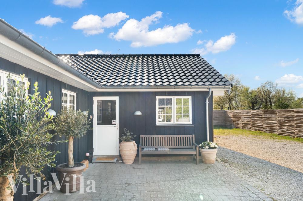 Genießen Sie einen Grillabend auf der Terrasse des Luxusferienhauses Nr. 991 in Nordseeland