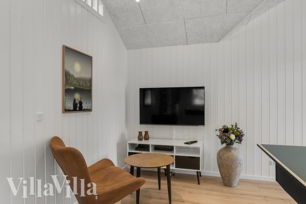Das Luxusferienhaus 972 für 16 Personen hat einen großen Aktivitätsraum mit u. a. Billard und Darts