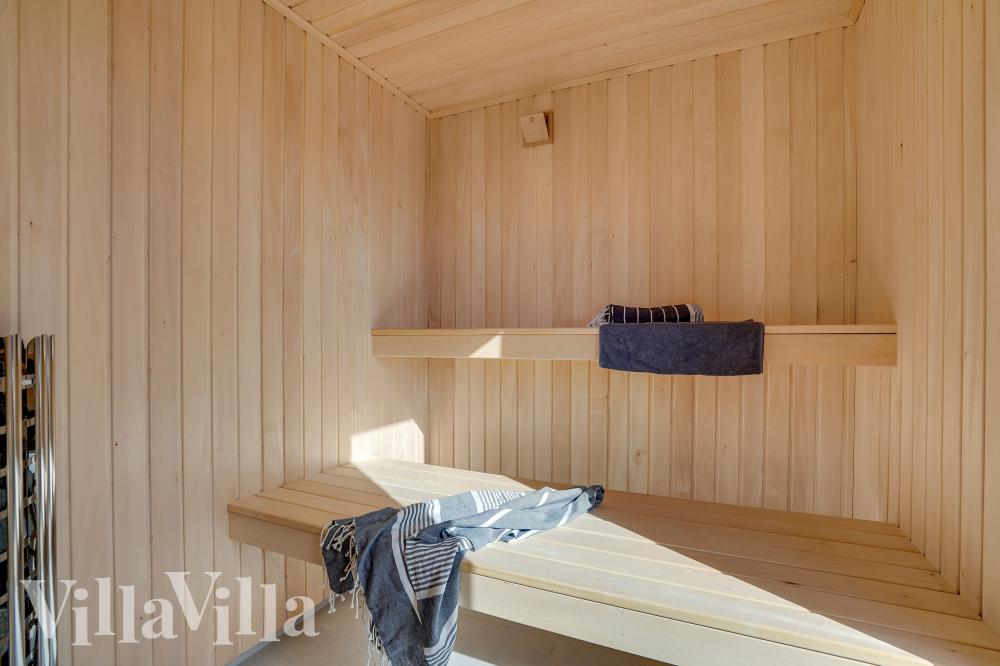 Genießen Sie die heiße Sauna im Luxusferienhaus Nr. 972 für 16 Personen
