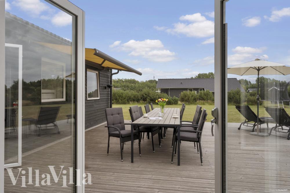 Das Luxusferienhaus Nr. 969 hat eine tolle Terrasse, die mit hochwertigen Gartenmöbeln für 12 Personen ausgestattet ist.