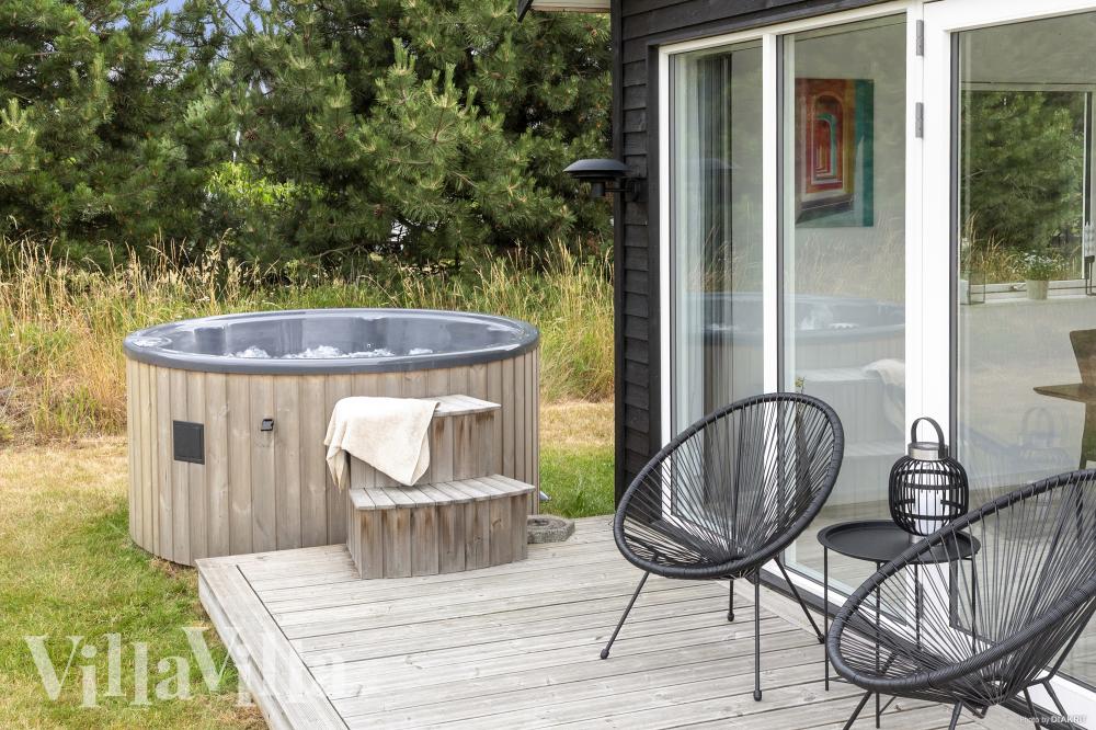 Im Luxusferienhaus Nr. 969 gibt es einen Whirlpool und 6 Schlafzimmer.