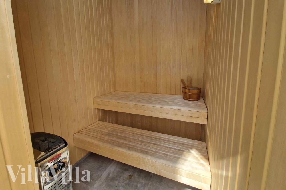 Genießen Sie die heiße Sauna im Luxusferienhaus Nr. 994 für 16 Personen