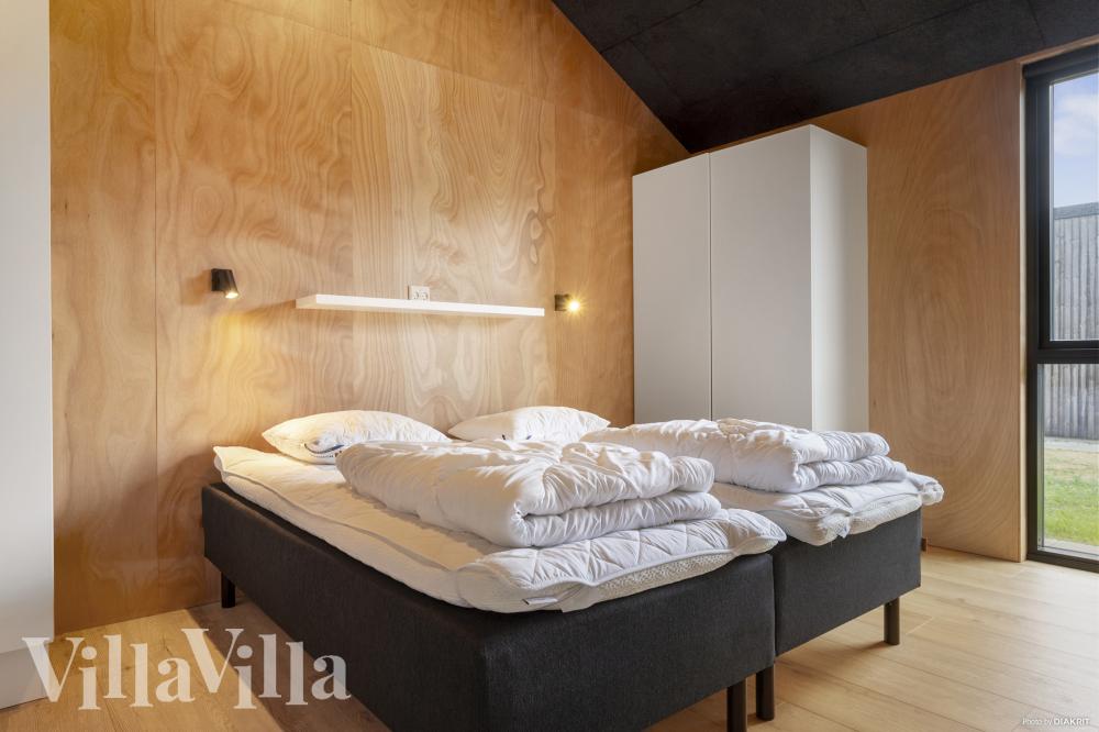 Eines der 8 Schlafzimmer im Luxusferienhaus Nr. 995
