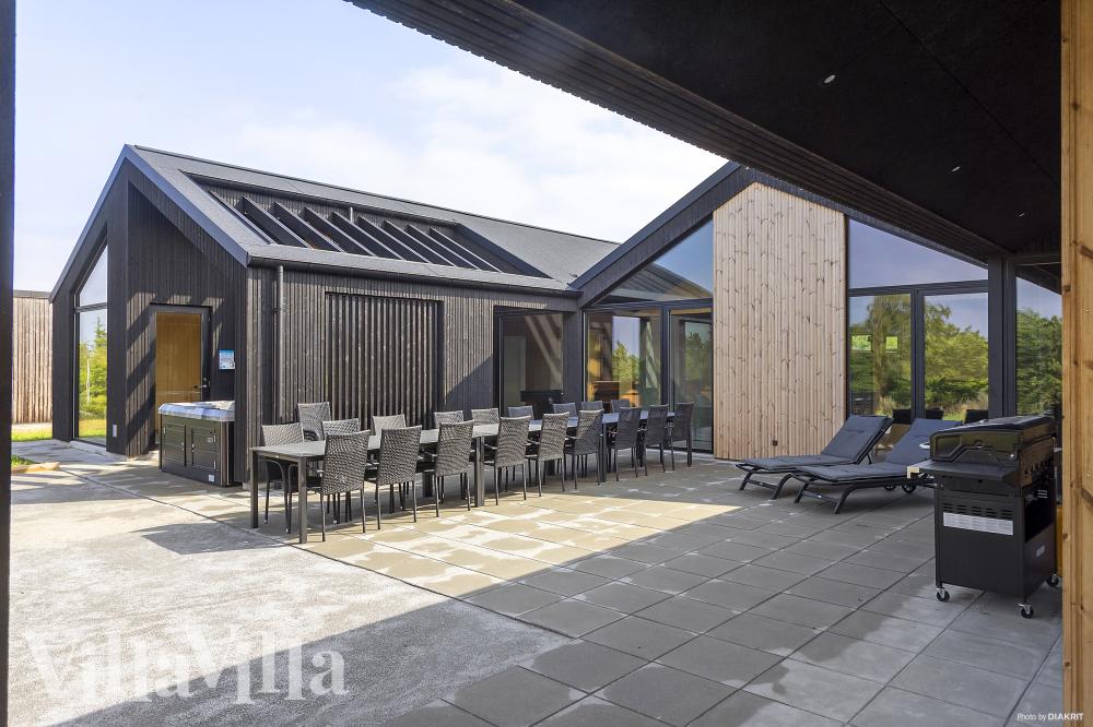 Das Luxusferienhaus Nr. 995 hat eine tolle Terrasse, die mit hochwertigen Gartenmöbeln für 26 Personen ausgestattet ist.