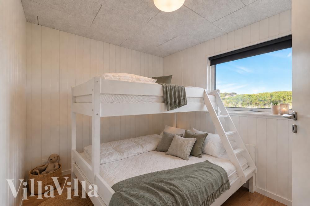 Eines der 5 Schlafzimmer im Luxusferienhaus Nr. 1000
