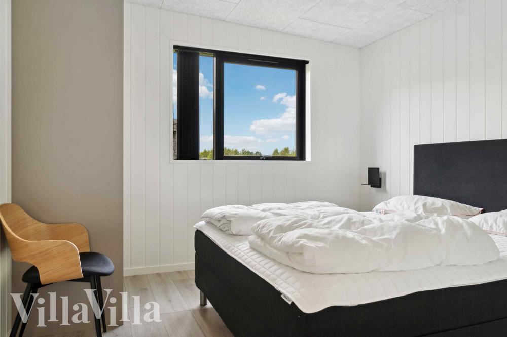 Eines der 6 Schlafzimmer im Luxusferienhaus Nr. 1002