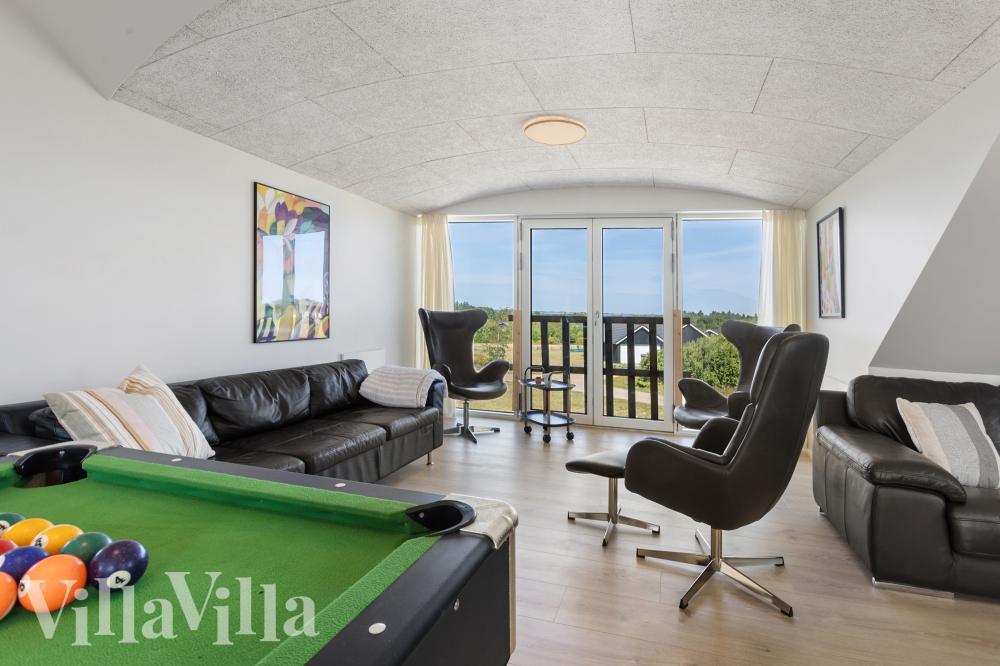 Neben den vielen schönen Stunden, die man im Poolbereich des Hauses verbringen kann, bietet das Luxusferienhaus 981 auch Spielevergnügen bei Billard/Tischtennis und Darts