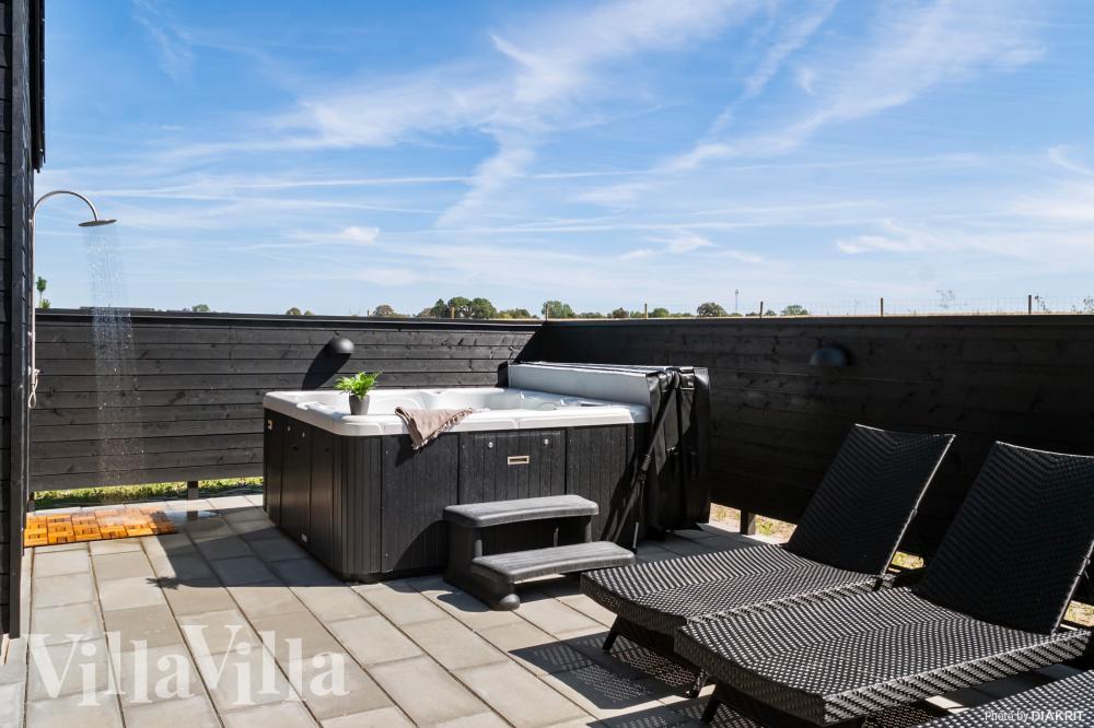Das Luxusferienhaus Nr. 921 bietet u. a. einen tollen Whirlpool