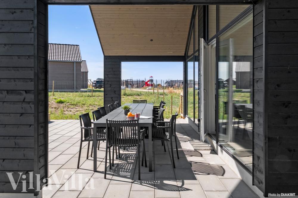 Genießen Sie einen Grillabend auf der Terrasse des Luxusferienhauses Nr. 921 in Fünen und seine Inseln