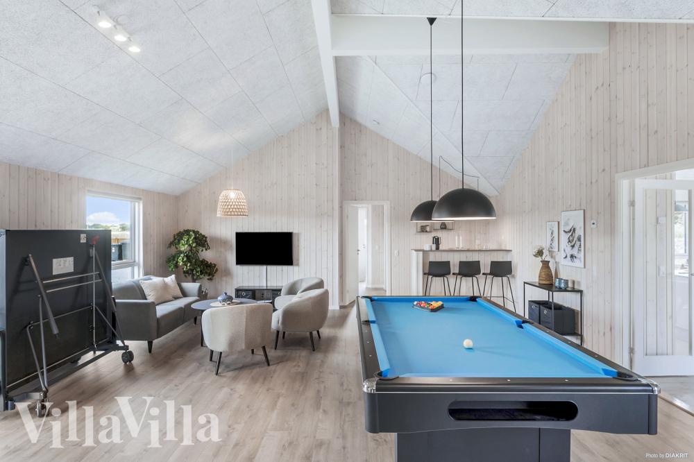 Neben den vielen schönen Stunden, die man im Poolbereich des Hauses verbringen kann, bietet das Luxusferienhaus 1001 auch Spielevergnügen bei Billard/Tischtennis und Darts