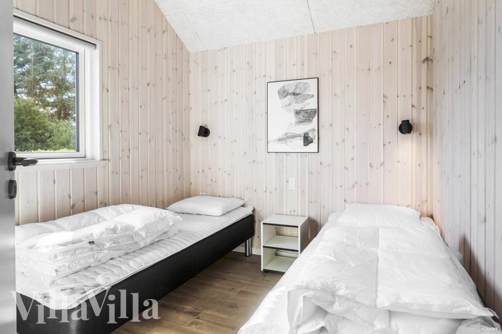 Eines der 10 Schlafzimmer im Luxusferienhaus Nr. 1001