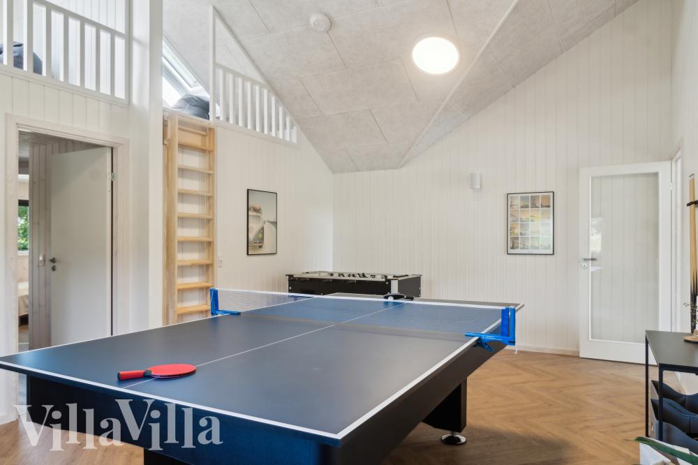 Aktivitätsraum im Luxusferienhaus Nr. 999 mit 5 Schlafzimmern und Platz für 14 Gäste.