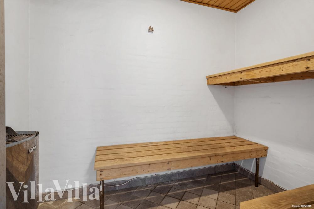 Genießen Sie die heiße Sauna im Luxusferienhaus Nr. 989 für 16 Personen