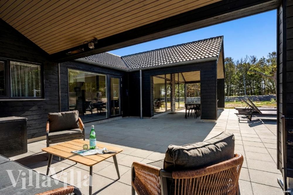 Das Luxusferienhaus Nr. 918 hat eine tolle Terrasse, die mit hochwertigen Gartenmöbeln für 18 Personen ausgestattet ist.