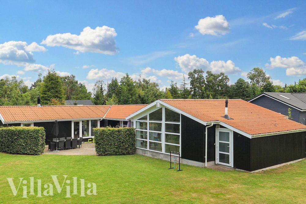 Dieses schöne Poolhaus Nr. 1003 mit Platz für 14 Personen liegt in Lolland/Falster/Mön