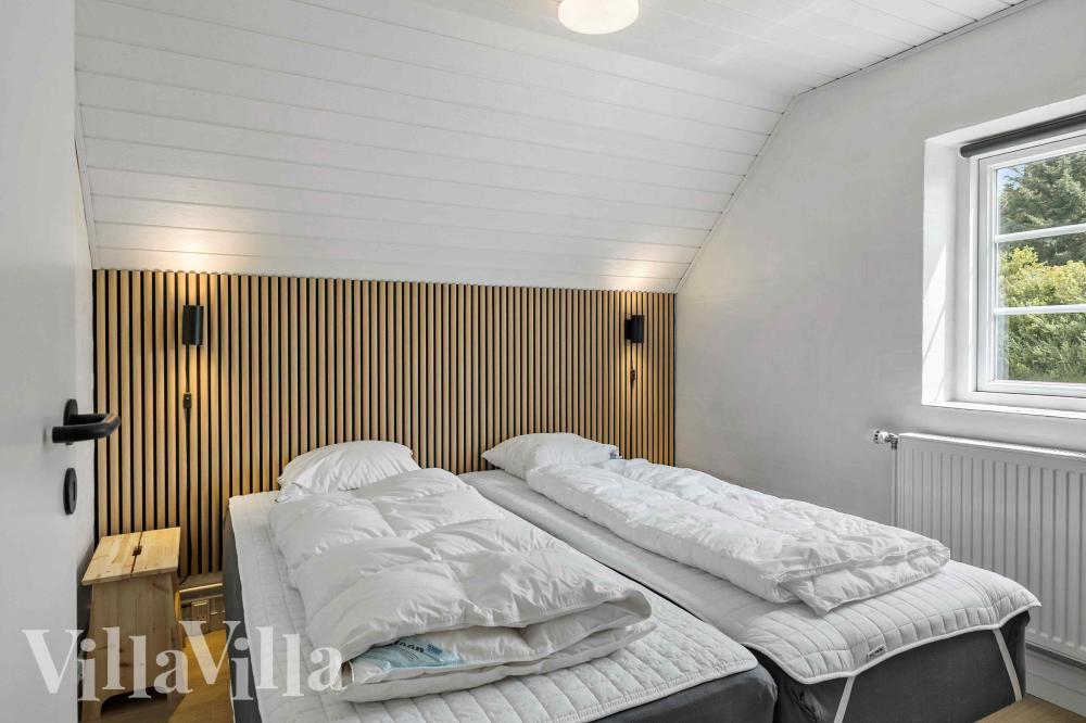 Eines der 6 Schlafzimmer im Luxusferienhaus Nr. 1005