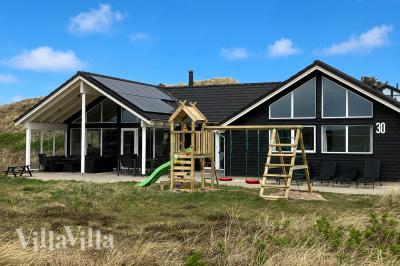 Dieses schöne Poolhaus Nr. 363 mit Platz für 20 Personen liegt in Westjütland