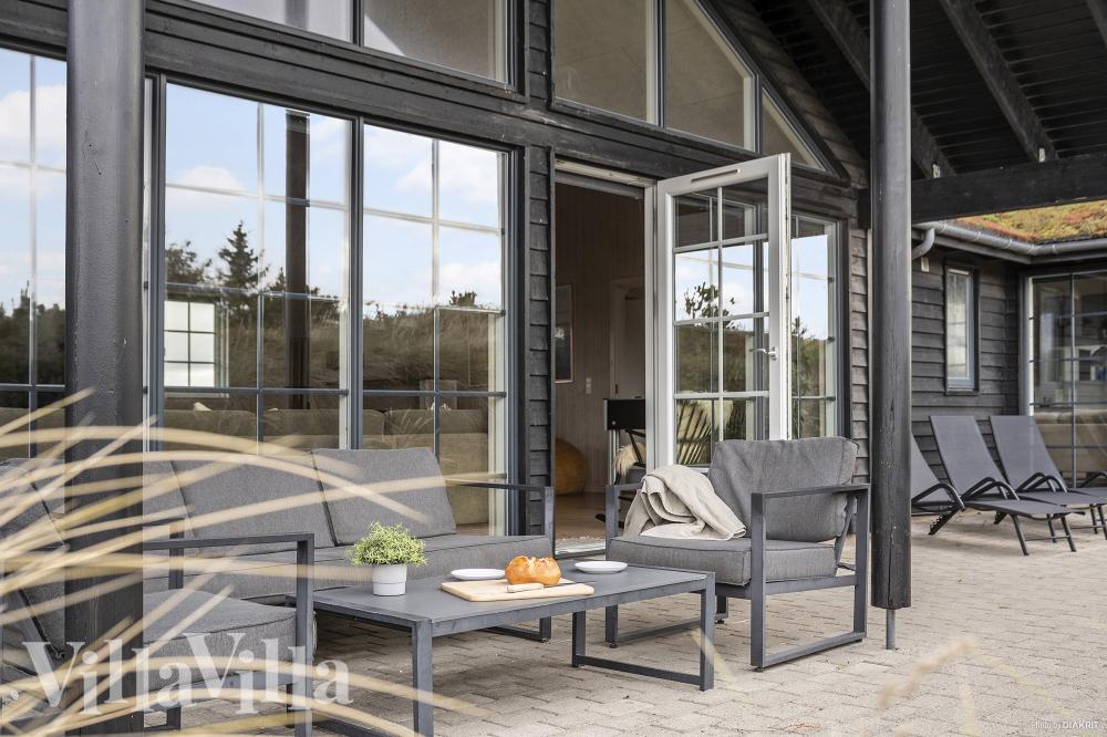 Das Luxusferienhaus Nr. 383 hat eine tolle Terrasse, die mit hochwertigen Gartenmöbeln für 18 Personen ausgestattet ist.