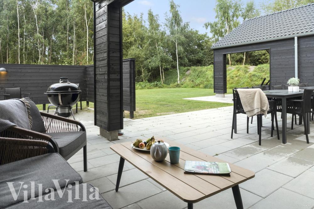 Das Luxusferienhaus Nr. 911 hat eine tolle Terrasse, die mit hochwertigen Gartenmöbeln für 20 Personen ausgestattet ist.