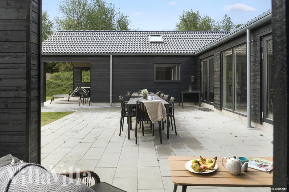 Genießen Sie einen Grillabend auf der Terrasse des Luxusferienhauses Nr. 911 in Lolland/Falster/Mön