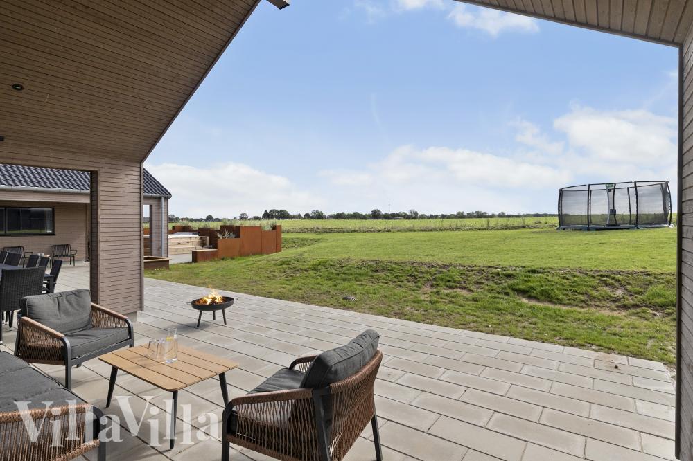 Genießen Sie einen Grillabend auf der Terrasse des Luxusferienhauses Nr. 917 in Fünen und seine Inseln