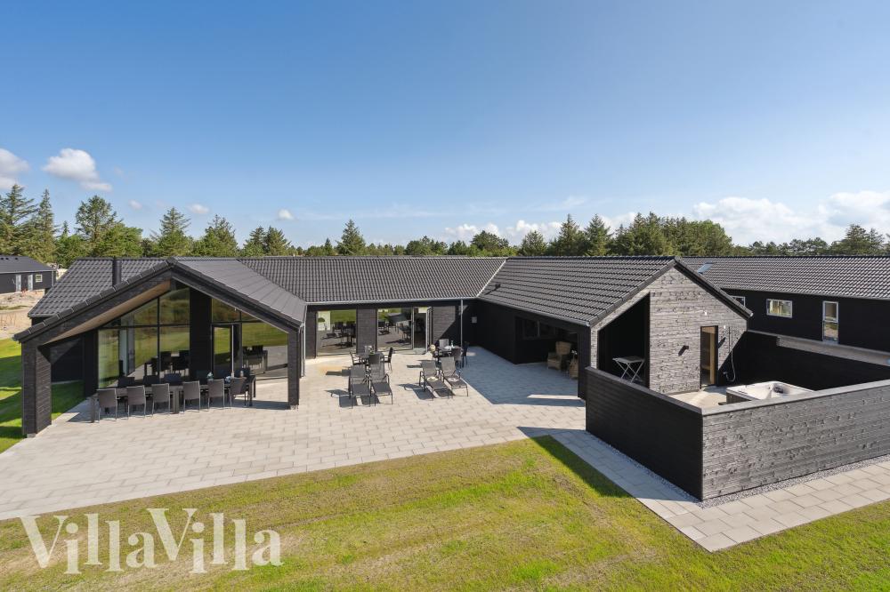 Dieses schöne Poolhaus Nr. 1006 mit Platz für 18 Personen liegt in Westjütland