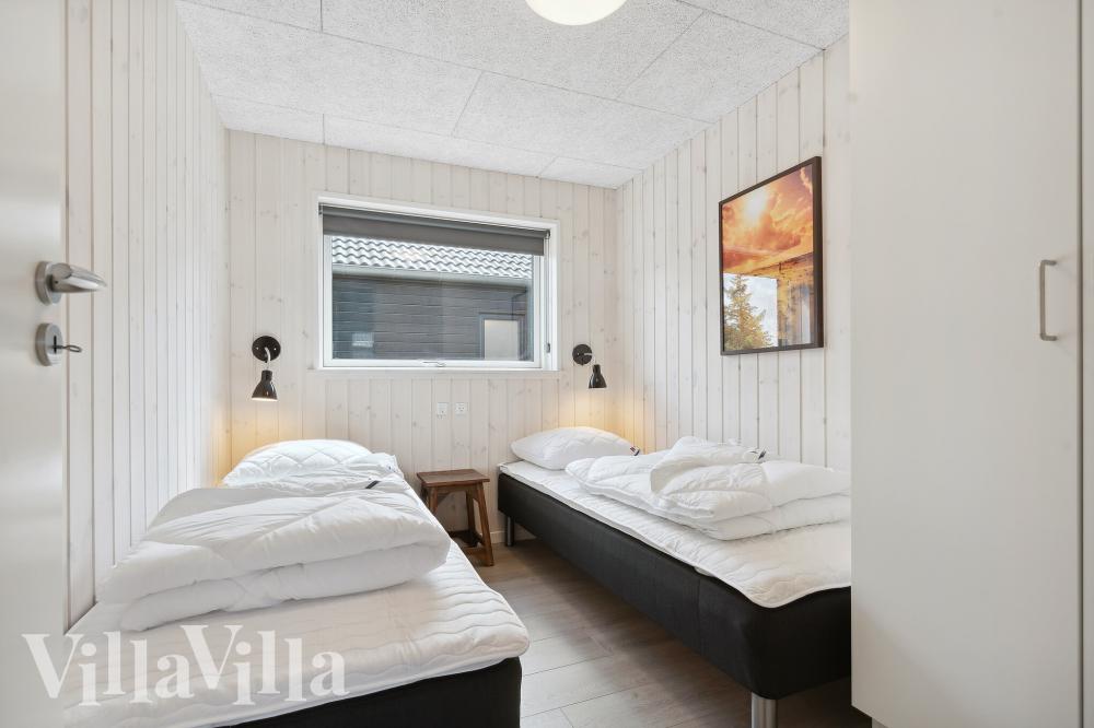 Eines der 7 Schlafzimmer im Luxusferienhaus Nr. 1006