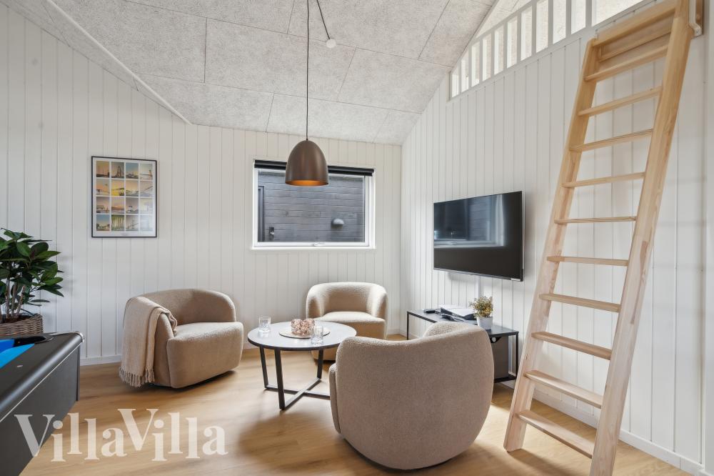 Aktivitätsraum im Luxusferienhaus Nr. 1015 mit 5 Schlafzimmern und Platz für 14 Gäste.