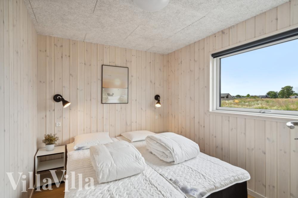 Eines der 5 Schlafzimmer im Luxusferienhaus Nr. 1015