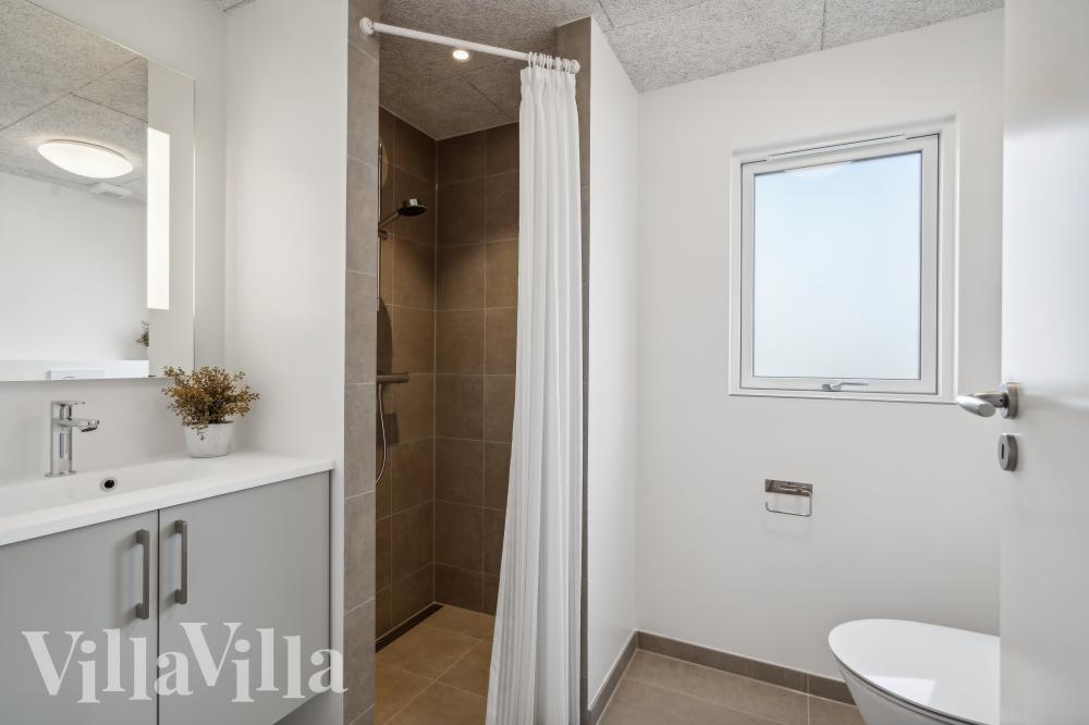 Eines der Badezimmer im Luxusferienhaus Nr. 1015