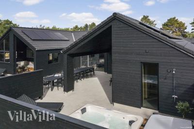 Dieses schöne Poolhaus Nr. 960 mit Platz für 18 Personen liegt in Lolland/Falster/Mön