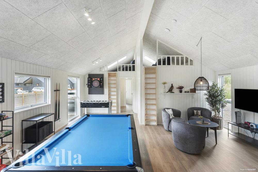 Neben den vielen schönen Stunden, die man im Poolbereich des Hauses verbringen kann, bietet das Luxusferienhaus 960 auch Spielevergnügen bei Billard/Tischtennis und Darts