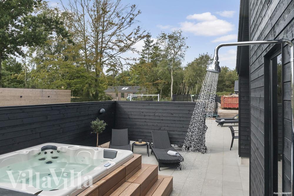 Genießen Sie den warmen Whirlpool im Luxusferienhaus Nr. 960 in Lolland/Falster/Mön