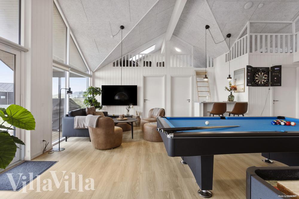 Neben den vielen schönen Stunden, die man im Poolbereich des Hauses verbringen kann, bietet das Luxusferienhaus 959 auch Spielevergnügen bei Billard/Tischtennis und Darts
