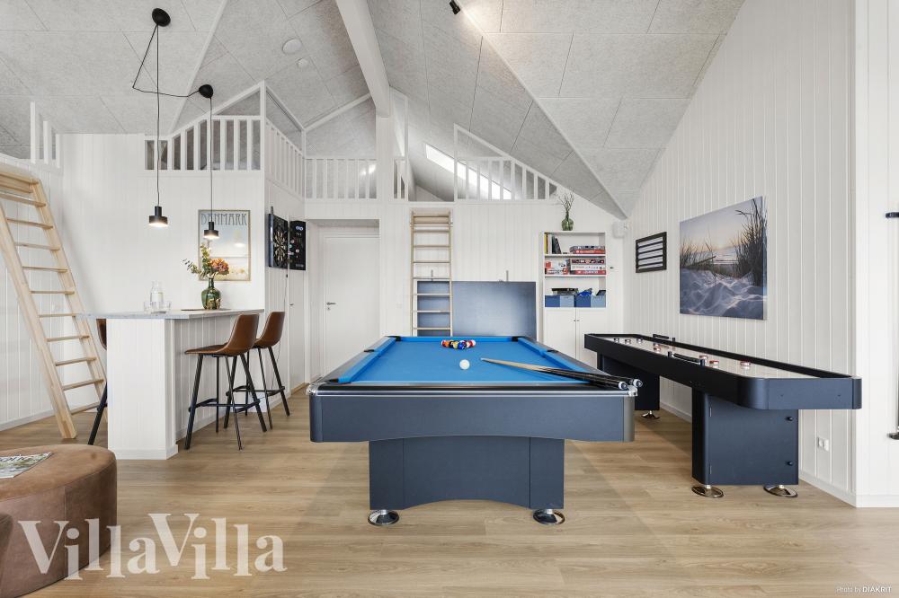 Das Luxusferienhaus 959 für 26 Personen hat einen großen Aktivitätsraum mit u. a. Billard und Darts