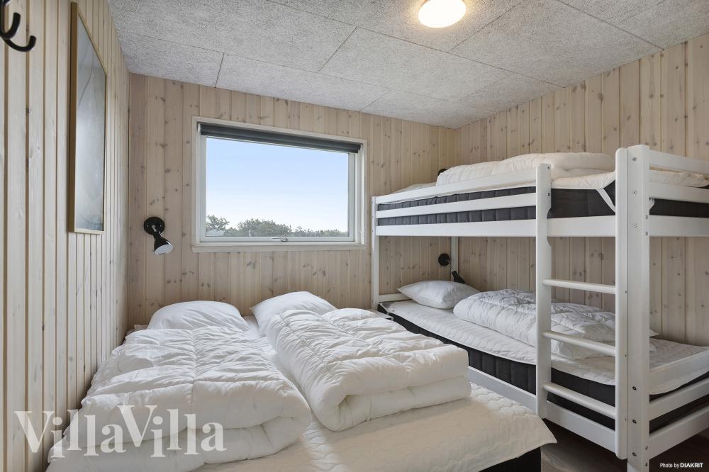 Eines der 8 Schlafzimmer im Luxusferienhaus Nr. 959