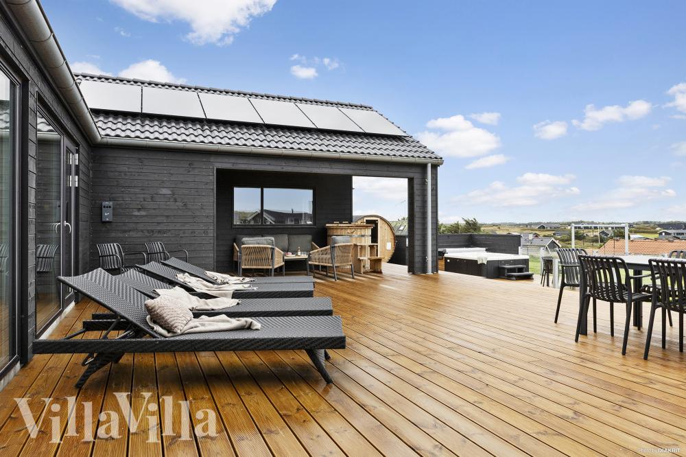 Genießen Sie einen Grillabend auf der Terrasse des Luxusferienhauses Nr. 959 in Nordjütland