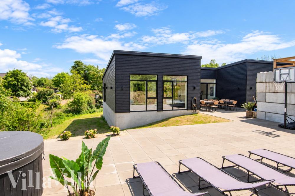 Dieses schöne Poolhaus Nr. 941 mit Platz für 16 Personen liegt in Ostjütland