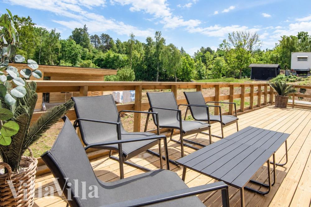 Genießen Sie einen Grillabend auf der Terrasse des Luxusferienhauses Nr. 941 in Ostjütland