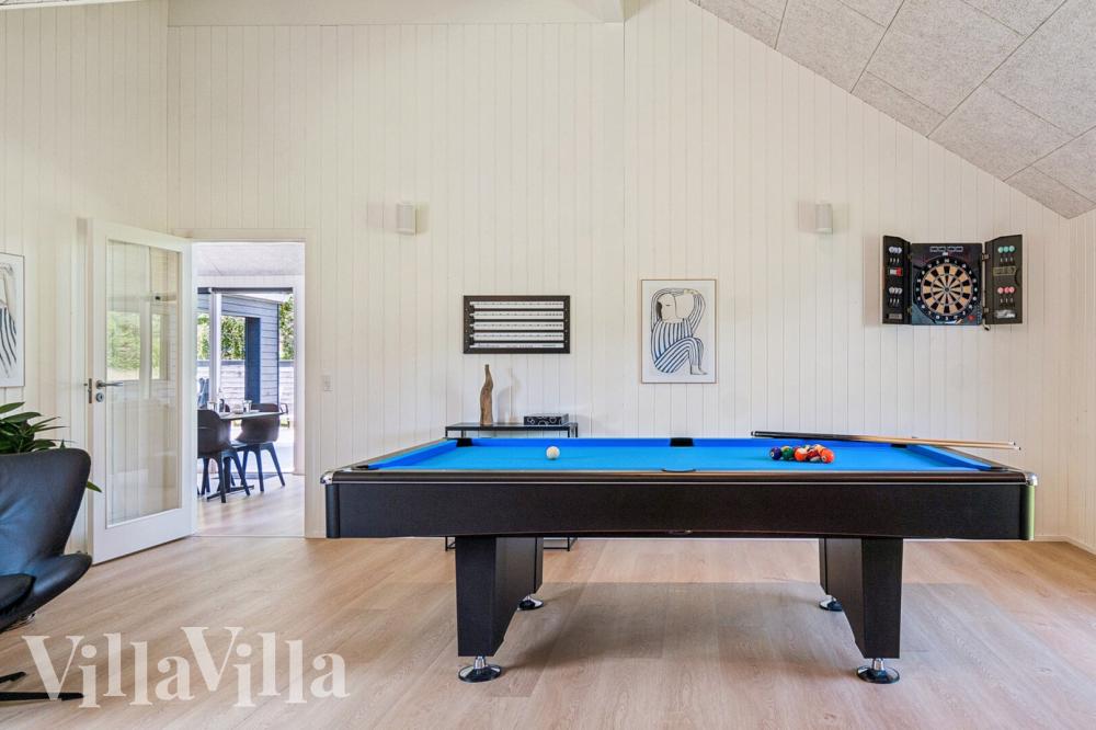 Das Luxusferienhaus 1020 für 14 Personen hat einen großen Aktivitätsraum mit u. a. Billard und Darts