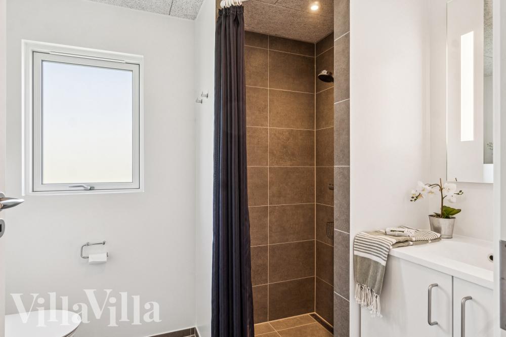 Eines der Badezimmer im Luxusferienhaus Nr. 1020