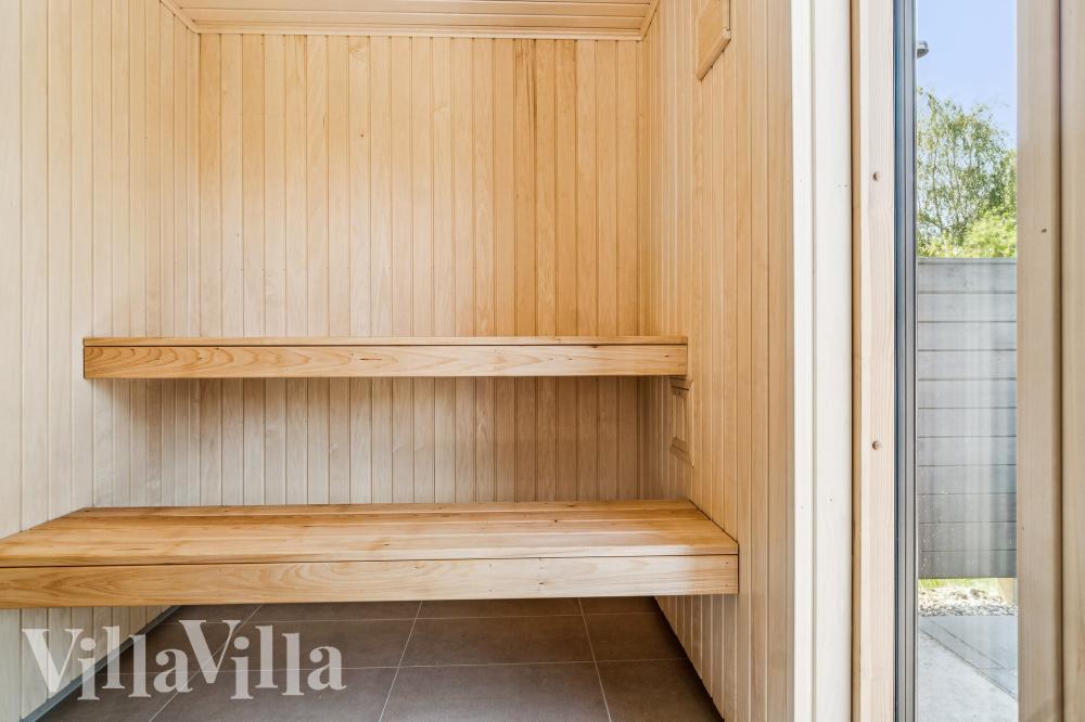 Genießen Sie die heiße Sauna im Luxusferienhaus Nr. 1020 für 14 Personen