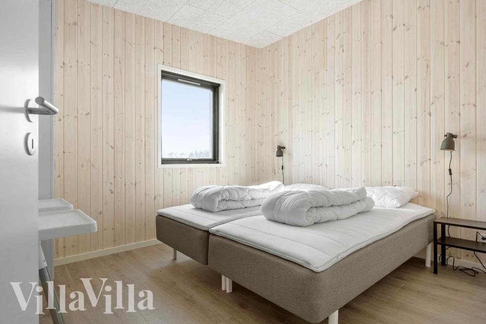 Eines der 7 Schlafzimmer im Luxusferienhaus Nr. 1014