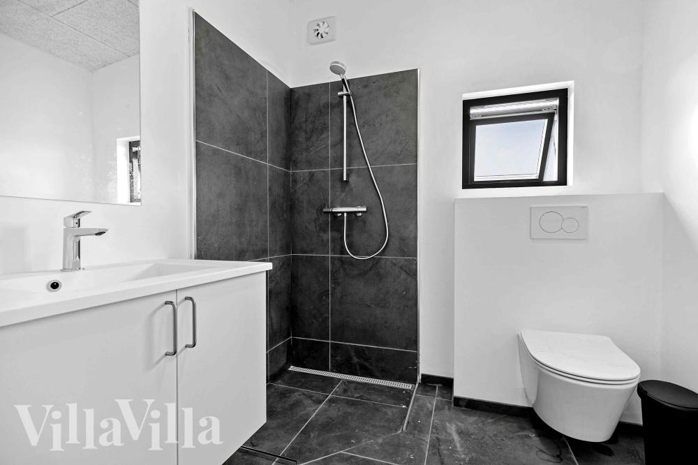 Eines der Badezimmer im Luxusferienhaus Nr. 1014
