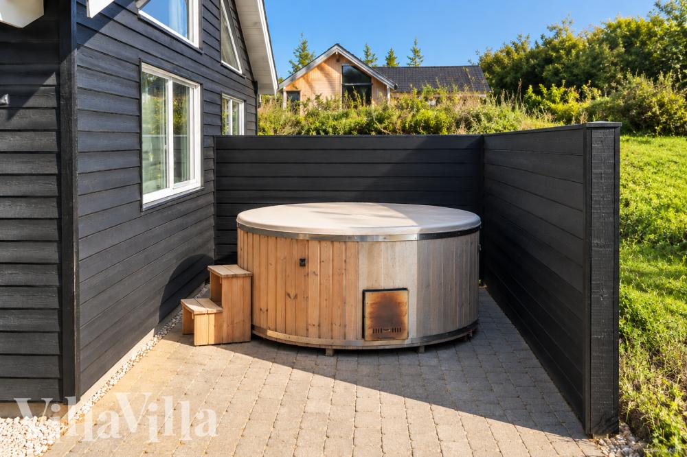 Das Luxusferienhaus Nr. 394 bietet u. a. einen tollen Whirlpool