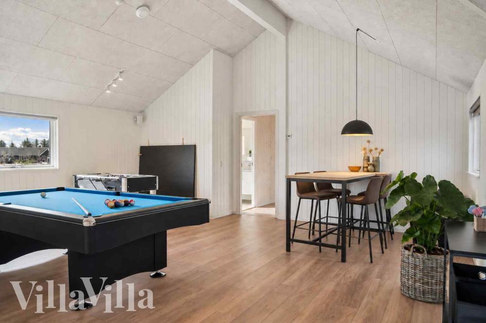 Neben den vielen schönen Stunden, die man im Poolbereich des Hauses verbringen kann, bietet das Luxusferienhaus 997 auch Spielevergnügen bei Billard/Tischtennis und Darts