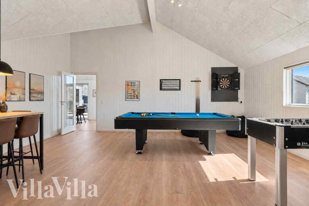 Das Luxusferienhaus 997 für 14 Personen hat einen großen Aktivitätsraum mit u. a. Billard und Darts