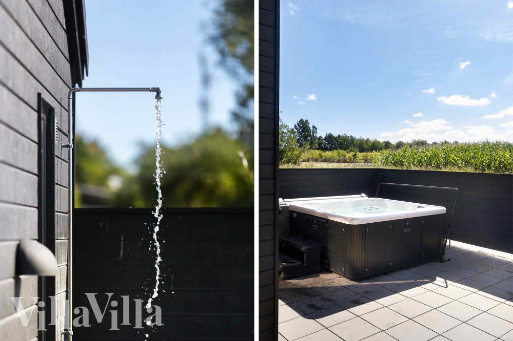 Genießen Sie den warmen Whirlpool im Luxusferienhaus Nr. 997 in Nordseeland