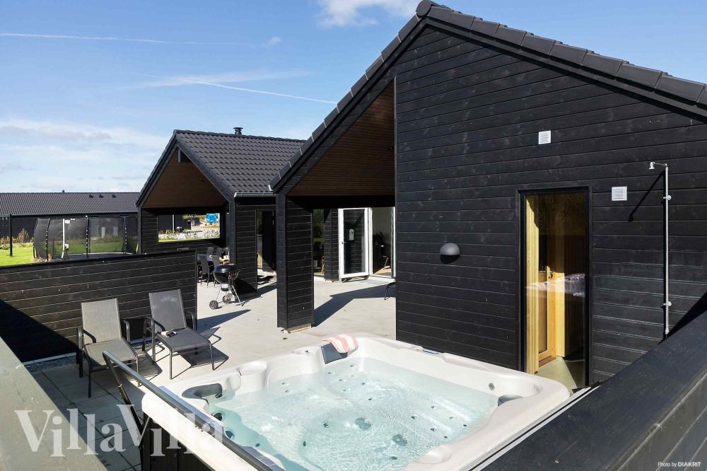 Das Luxusferienhaus Nr. 997 bietet u. a. einen tollen Whirlpool